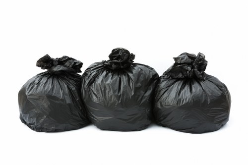 Commercial waste removal trucks at work in Chingford